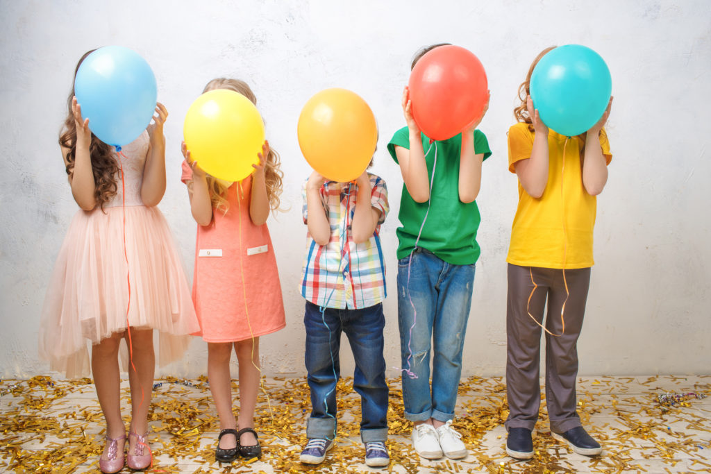 Children Holding Balloons