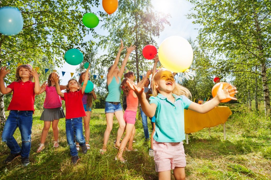 Children Catching Balloons