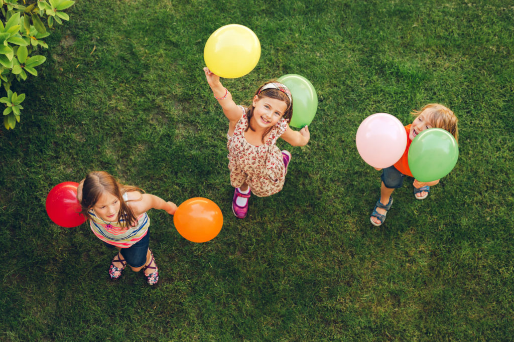 Children Playing with Balloons